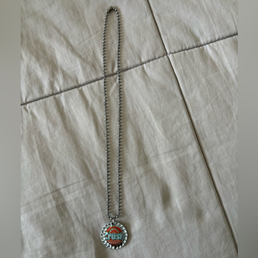 Orange Crush Necklace with Circular Design